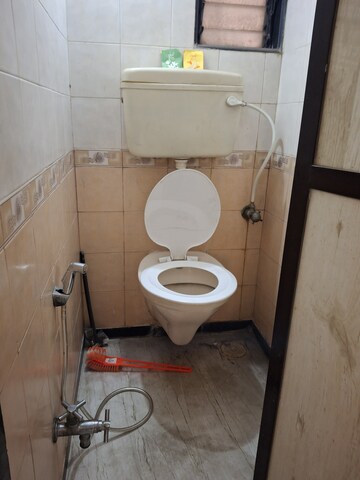 Bathroom in 2.5 BHK Apartment at Mudit Garden, Kopar Khairane – for Rent