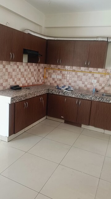 Kitchen in 2 BHK Apartment at Panchsheel Greens II, Sector 16 Greater Noida – for Rent