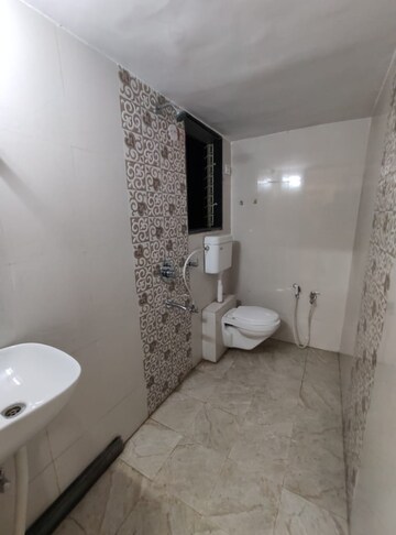 Bathroom in 2 BHK Apartment at Mohan Willows, Badlapur East – for Rent