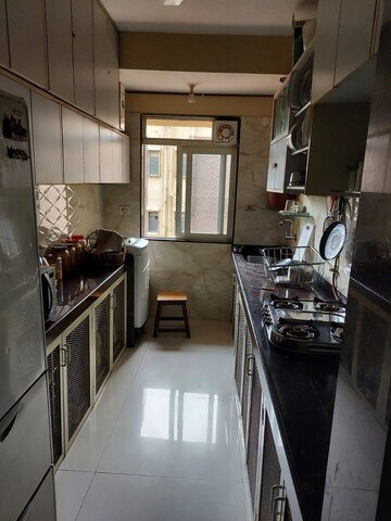Kitchen in 2 BHK Apartment at Kamala Nav Natraj, Santacruz West – for Sale