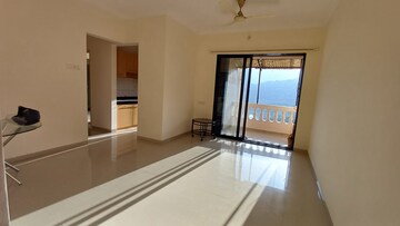 Living Room in 2 BHK Apartment at Raunak Paradise, Kokanipada – for Rent