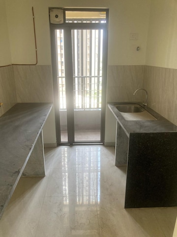 Kitchen in 2 BHK Apartment at Kalpataru Paramount, Kapur Bawdi – for Rent