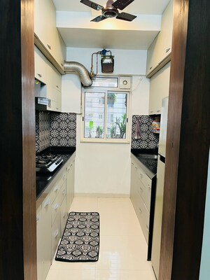 Kitchen in 1 BHK Apartment at Lodha Amara, Kolshet Road – for Sale