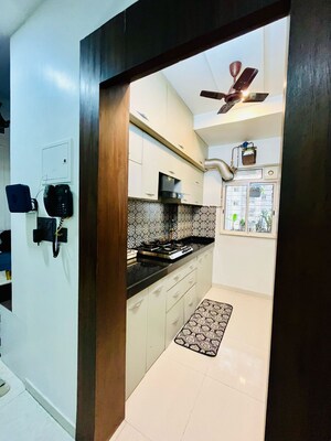 Kitchen in 1 BHK Apartment at Lodha Amara, Kolshet Road – for Sale