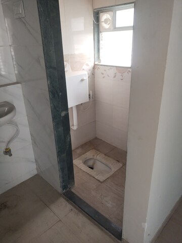 Bathroom in 1 BHK Apartment at Ruparel The Orion, Chembur – for Rent