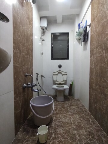 Bathroom in 3 BHK Apartment at Shree Balaji Satyam Towers, Kopar Khairane – for Rent