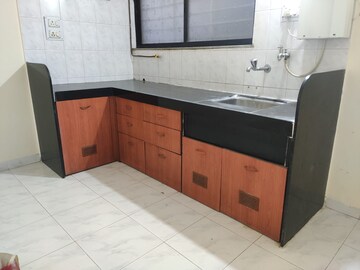 Kitchen in 2 BHK Apartment at Sayali Garden, Aundh – for Rent