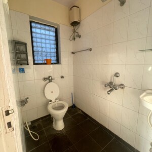 Bathroom in 2 BHK Apartment at Valentine Apartments, Shiv Darshan Nagar – for Sale