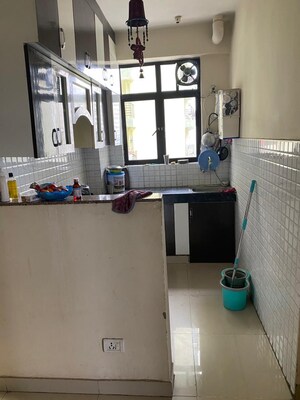 Kitchen in 2 BHK Apartment at Devika Skypers, Raj Nagar Extension – for Sale