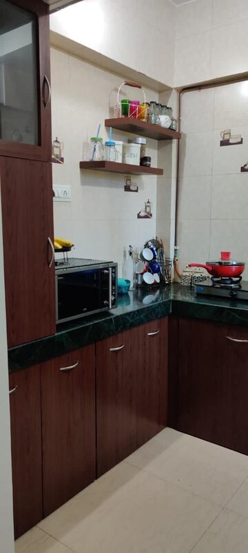 Kitchen in 1 BHK Apartment at Vihang Valley Phase1, Kasarvadavali – for Rent