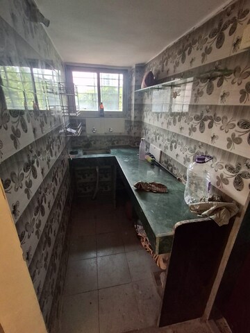 Kitchen in 1 RK Apartment at Rutu Enclave, Kasarvadavali – for Rent