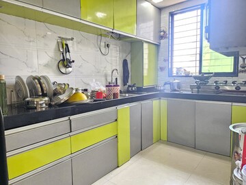 Kitchen in 2 BHK Apartment at Varad Vinayak Garden CHS, Khanda Colony – for Rent