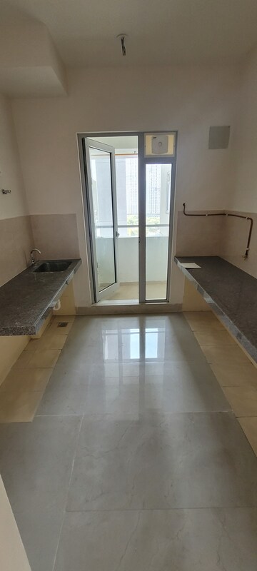 Kitchen in 2 BHK Apartment at Piramal Vaikunth, Balkum Pada – for Rent