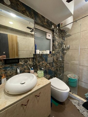 Bathroom in 4 BHK Apartment at Conscient Heritage Max, Sector 102 – for Rent