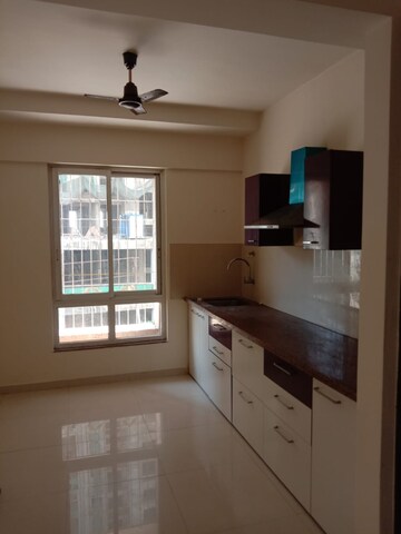 Kitchen in 1 BHK Apartment at Puranik Rumah Bali, Ghodbunder Road – for Rent