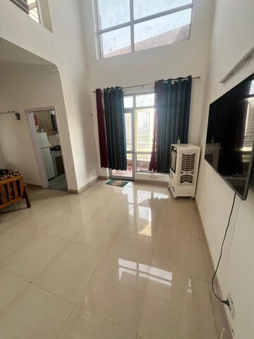 Living Room in 2 BHK Apartment at Satya The Hermitage, Sector 103 – for Rent