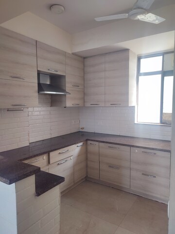 Kitchen in 2 BHK Apartment at Unitech The Residences Sector 33, Sector 33 – for Rent
