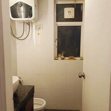 Bathroom in 4 BHK Apartment at Satya The Hermitage, Sector 103 – for Rent
