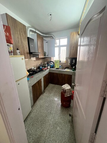 Kitchen in 4 BHK Apartment at Satya The Hermitage, Sector 103 – for Rent