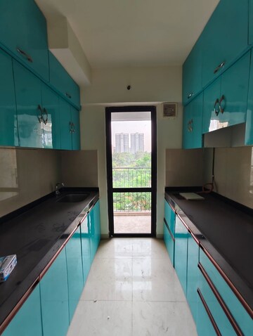 Kitchen in 2.5 BHK Apartment at Lodha Lakeshore Greens, Dombivli East – for Rent