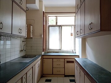 Kitchen in 2 BHK Apartment at DLF Silver Oaks, Sector 26 – for Sale