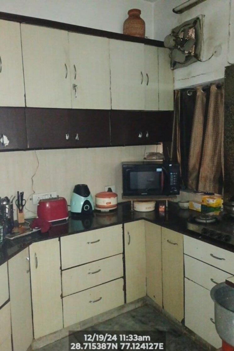 Kitchen, ganga-triveni-apartment 3 Bedroom 1100 Sq.Ft. Apartment In Rohini Sector 9 Delhi 7951724