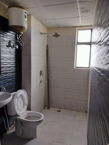 Bathroom in 4 BHK Apartment at Tech Zone 4 Greater Noida – for Sale