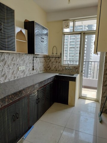 Kitchen in 4 BHK Apartment at Tech Zone 4 Greater Noida – for Sale