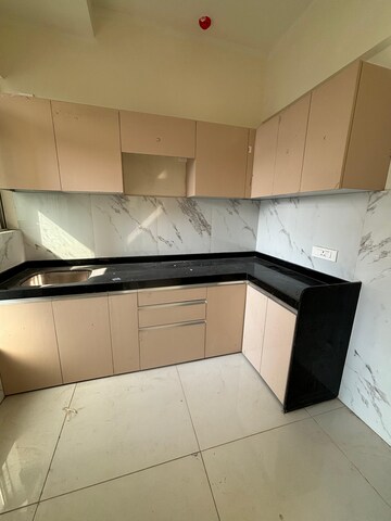 Kitchen in 2 BHK Apartment at Wadhwa Atmosphere O2, Mulund West – for Sale