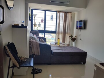 Living Room in 1 BHK Apartment at Queenstown Springs, Ghansoli – for Rent