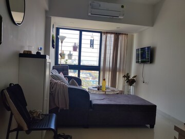 Living Room in 1 BHK Apartment at Queenstown Springs, Ghansoli – for Rent