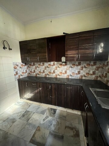 Kitchen in 2 BHK Apartment at Huda CGHS, Sector 56 – for Rent