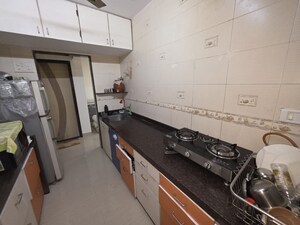 Kitchen in 1 BHK Apartment at Raj Garden, Kandivali West – for Sale