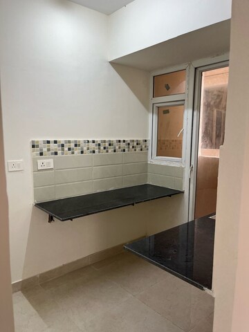 Kitchen in 3 BHK Apartment at Signature Global Orchard Avenue, Sector 93 – for Rent