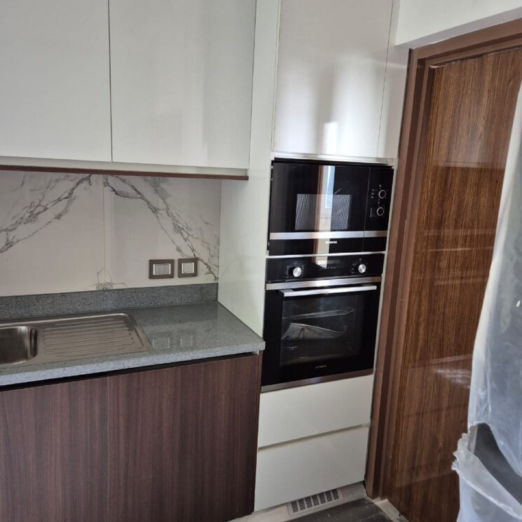 Kitchen, emaar-the-palm-drive-palm-studios 2 Bedroom 1200 Sq.Ft. Apartment In Sector 66 Gurgaon 8565952