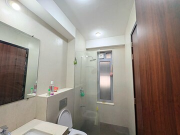 Bathroom in 3 BHK Apartment at Piramal Vaikunth, Balkum Pada – for Rent