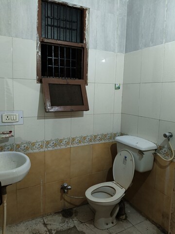 Bathroom in 3 BHK Builder Floor at Dhakoli Village – for Rent