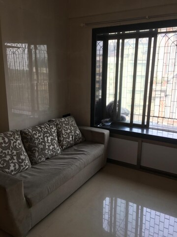 Living Room in 1 BHK Apartment at Tardeo – for Rent