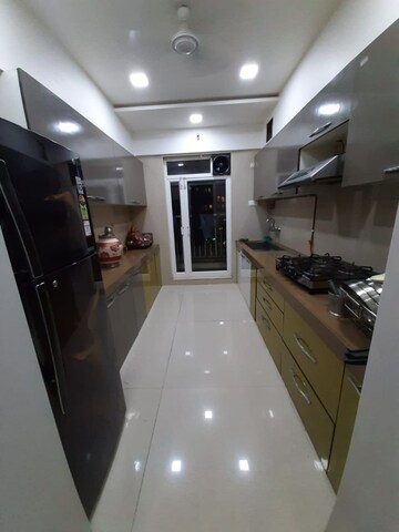 Kitchen in 2 BHK Apartment at Dosti Group Imperia, Manpada – for Rent