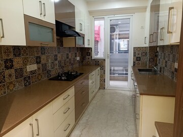 Kitchen in 4 BHK Builder Floor at Ansal API Esencia, Sector 67 – for Rent