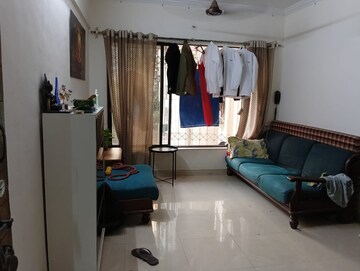 Living Room in 1 BHK Apartment at HDIL Dheeraj Jamuna, Malad West – for Rent