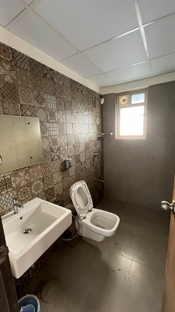 Bathroom in 2 BHK Apartment at Rishita Manhattan, Gomti Nagar – for Sale