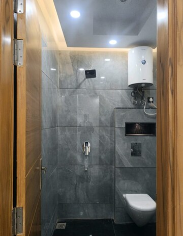 Bathroom in 3 BHK Builder Floor at Vasant Enclave – for Sale