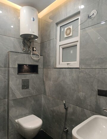 Bathroom in 3 BHK Builder Floor at Vasant Enclave – for Sale