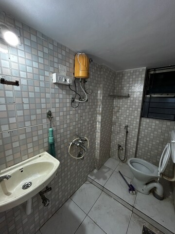 Bathroom in 2 BHK Apartment at Ravi Estate, Pokhran Road No 1 – for Rent