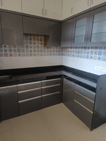 Kitchen in 1 BHK Apartment at Raunak Bliss, Ghodbunder Road – for Rent