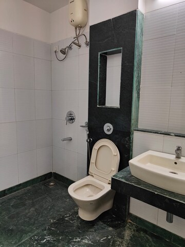 Bathroom in 1 BHK Apartment at Raunak Bliss, Ghodbunder Road – for Rent