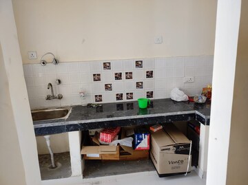 Kitchen in 2 BHK Apartment at Raj Nagar Extension – for Sale