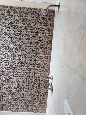 Bathroom in 2 BHK Apartment at Raj Nagar Extension – for Sale