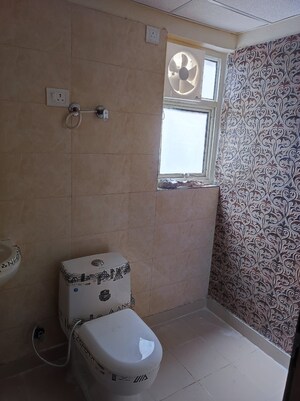 Bathroom in 2 BHK Apartment at Raj Nagar Extension – for Sale